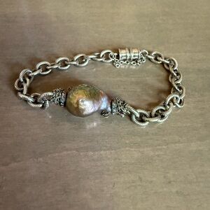 Elegant Sterling Silver and Iridescent Akoya Pearl bracelet.
